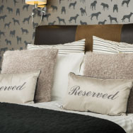 Reserved Cushions on Bed in a Pet Friendly Room